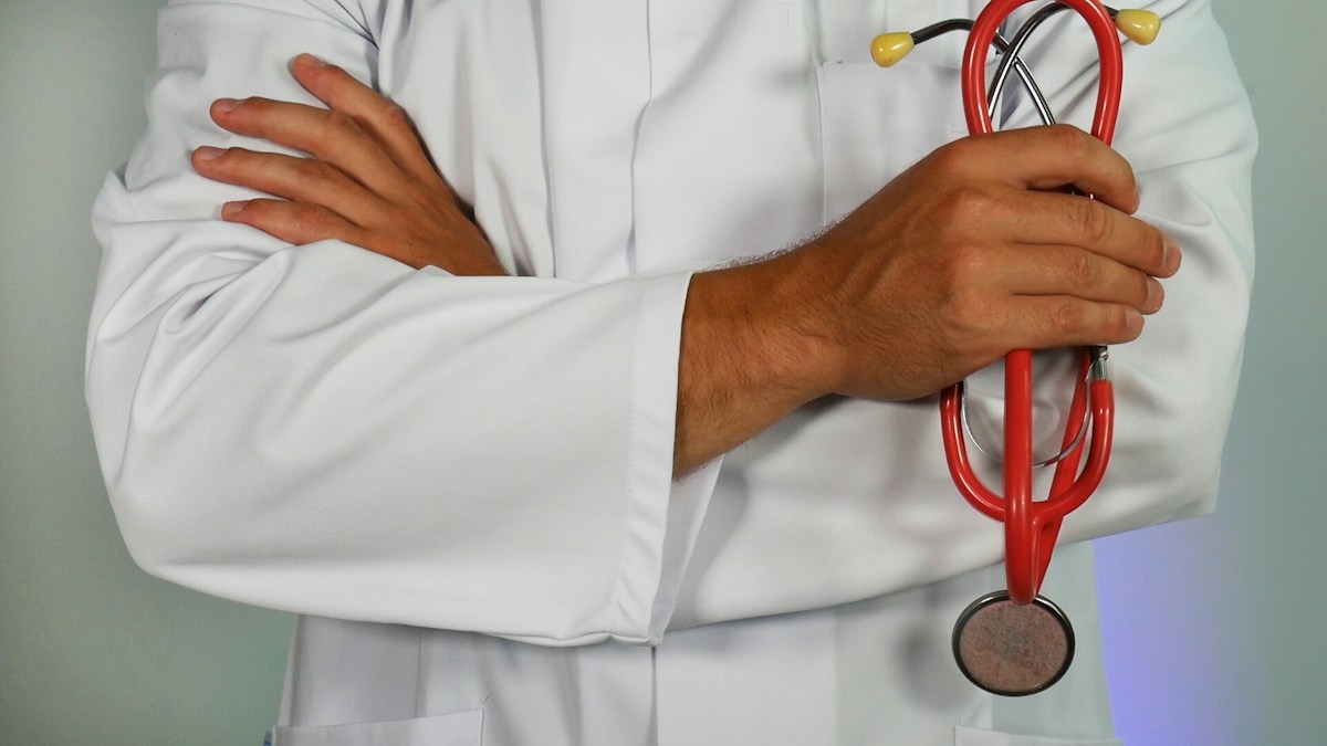 Clinical researcher evaluating FDA microbiology assay