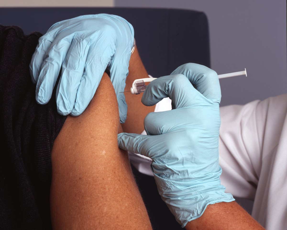 Hospital grade pulse oximeter sensor on patient finger